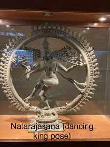 Ancient bronze and stone statues of gods & goddesses in yoga poses